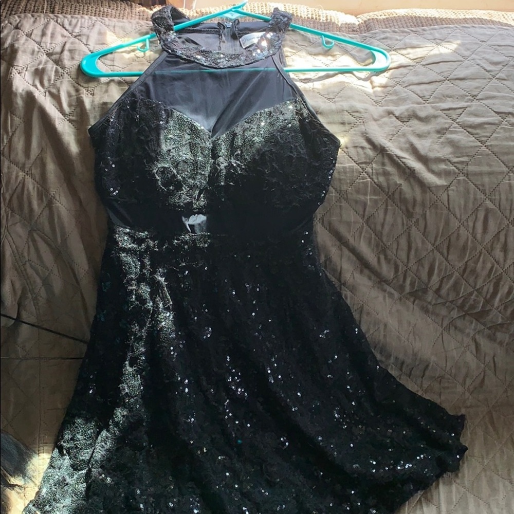 Black sequins and sheer short dress